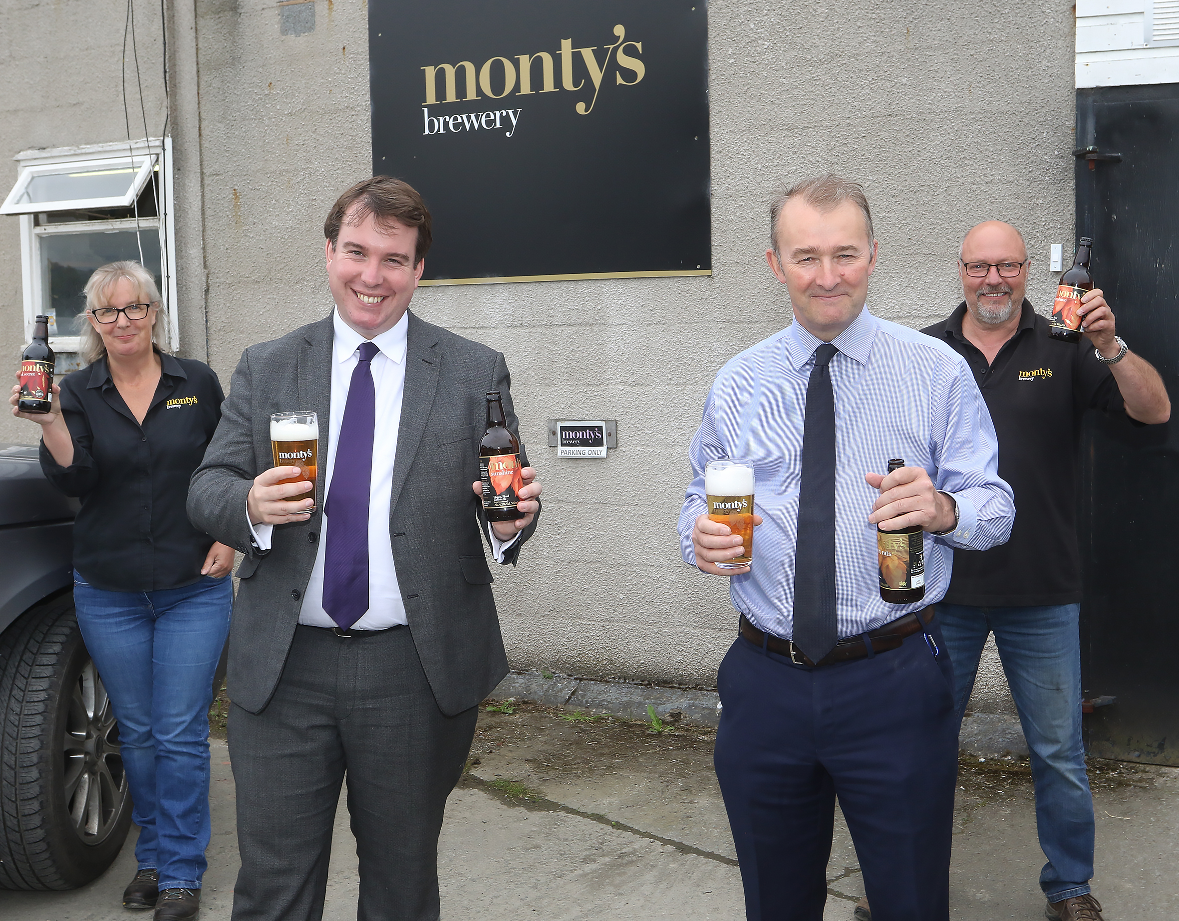  (L-R) Pam Honeyman, Craig Williams MP, Secretary of State for Wales Simon Hart and Russ Honeyman, at Monty's Brewery in Montgomery. Photo by Phil Blagg Photography